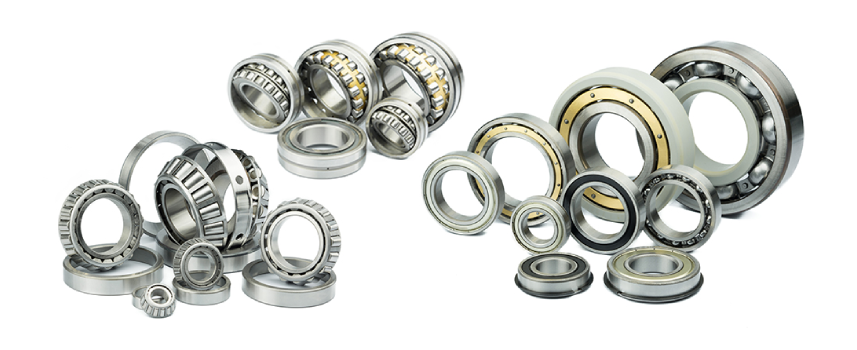 A collection of various ball and roller bearings, arranged in clusters. The metal components showcase industrial precision and functionality.